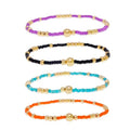 Gold Beaded Stackable Friendship Bracelets Set for Women, Handmade Boho Stretch Summer Jewelry Gift. - color: gold orange purple black blue
