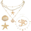 Tondiamo 7pcs Beach Jewelry Set for Women, Gold Starfish Seashell Waist Body Chain, Hair Clips, Seashell Starfish Necklaces Stackable, Gold Pearl Arm Cuff Bracelet Beach Vacation Mermaid Accessories