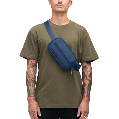 Incase Crosstown Sling - Compact, Durable and Lightweight, Crossbody & Hip Carry, Faux Fur Device Pocket, Easy Access Pockets - color: Navy