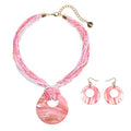 Coiris Multi Strand Statement Colorful Beaded Necklace with Big Circle Shell Pendant for Women - color: Pink