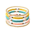 GOOJIDS Surfer Heishi Clay Bead Bracelets for Women Bohemian Stackable Gold Plated Beaded Stretch Bracelets Elastic Layering Friendship Bracelets Set Boho Jewelry - color: A-Multicolor 5pcs