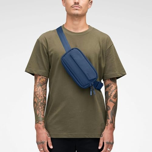 Incase Crosstown Sling - Compact, Durable and Lightweight, Crossbody & Hip Carry, Faux Fur Device Pocket, Easy Access Pockets - color: Navy