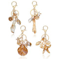 4 Pcs Ocean Themed Keychains for Women - Resin Seashell Starfish Boho Beach Bag Charms with Gold-Plated, Summer Vacation Purse Backpack Pendant Key Ring Gifts