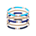 GOOJIDS Surfer Heishi Clay Bead Bracelets for Women Bohemian Stackable Gold Plated Beaded Stretch Bracelets Elastic Layering Friendship Bracelets Set Boho Jewelry - color: B-Blue Surfer Color & Gold Bead
